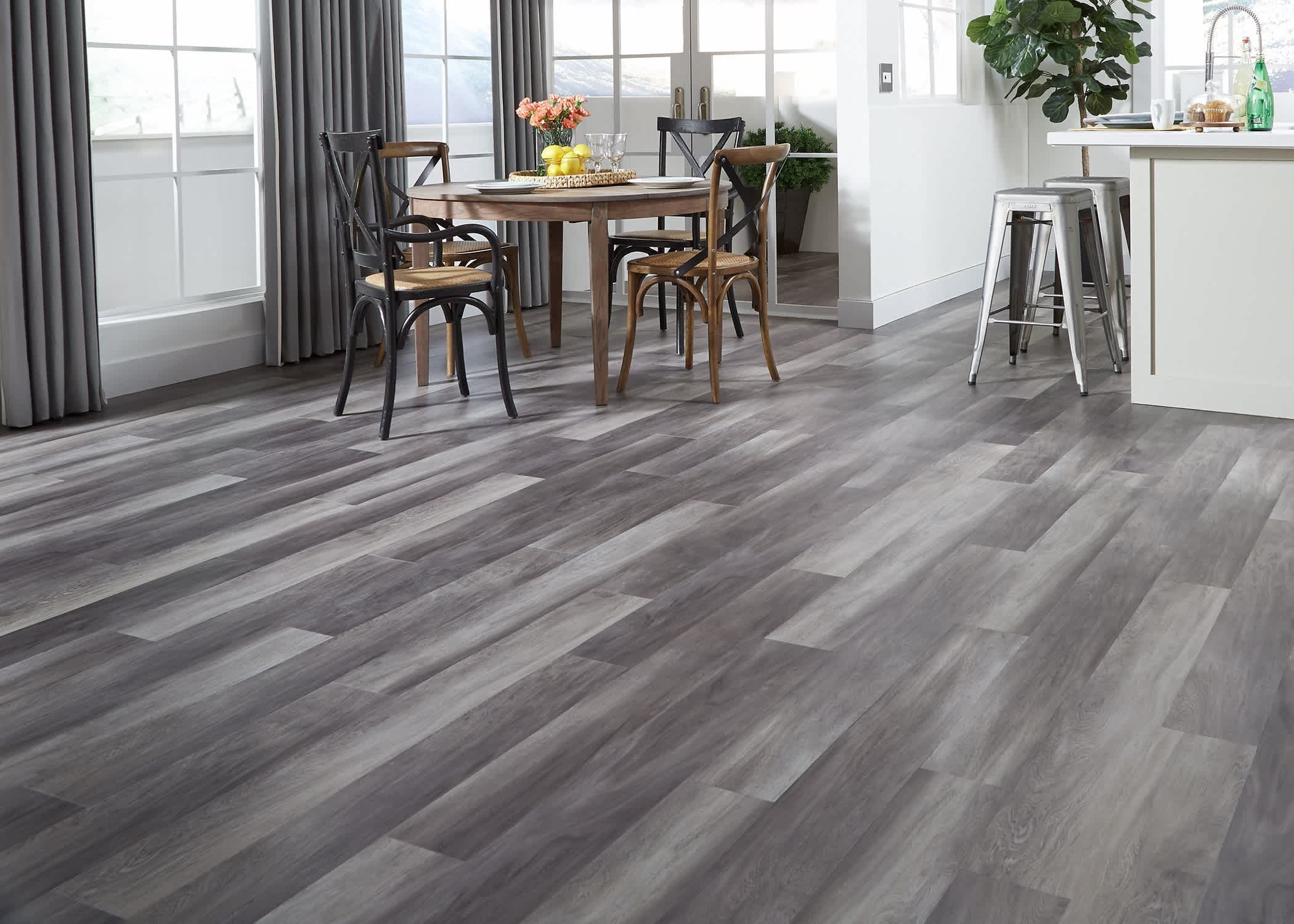 stormy gray oak waterproof vinyl flooring in dining room