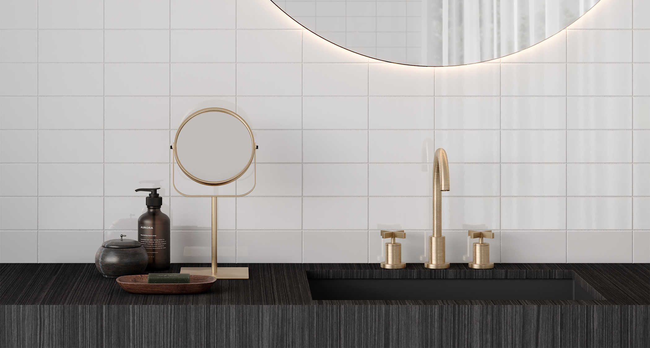 White Ceramic Subway Tile in bathroom on wall with brass faucet and dark vanity
