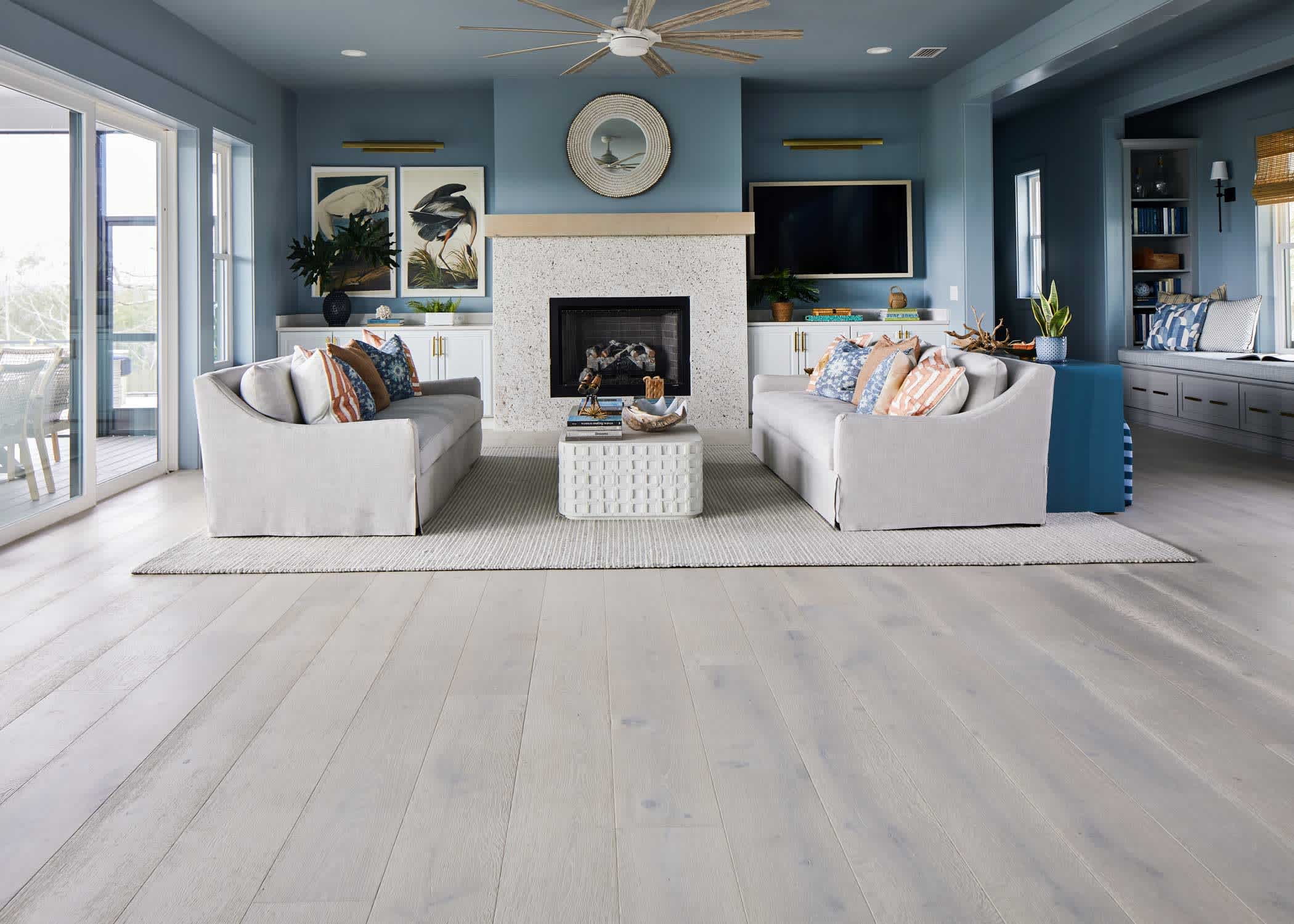 hgtv dream home 2024 living room with clearwater beach white oak engineered hardwood floors plus blue walls and beige sofas