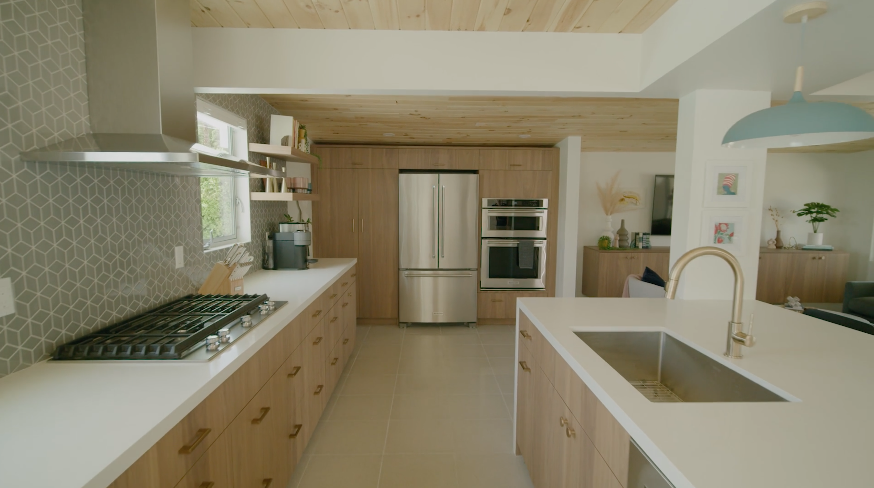 kitchen with white counters and wood on ceiling