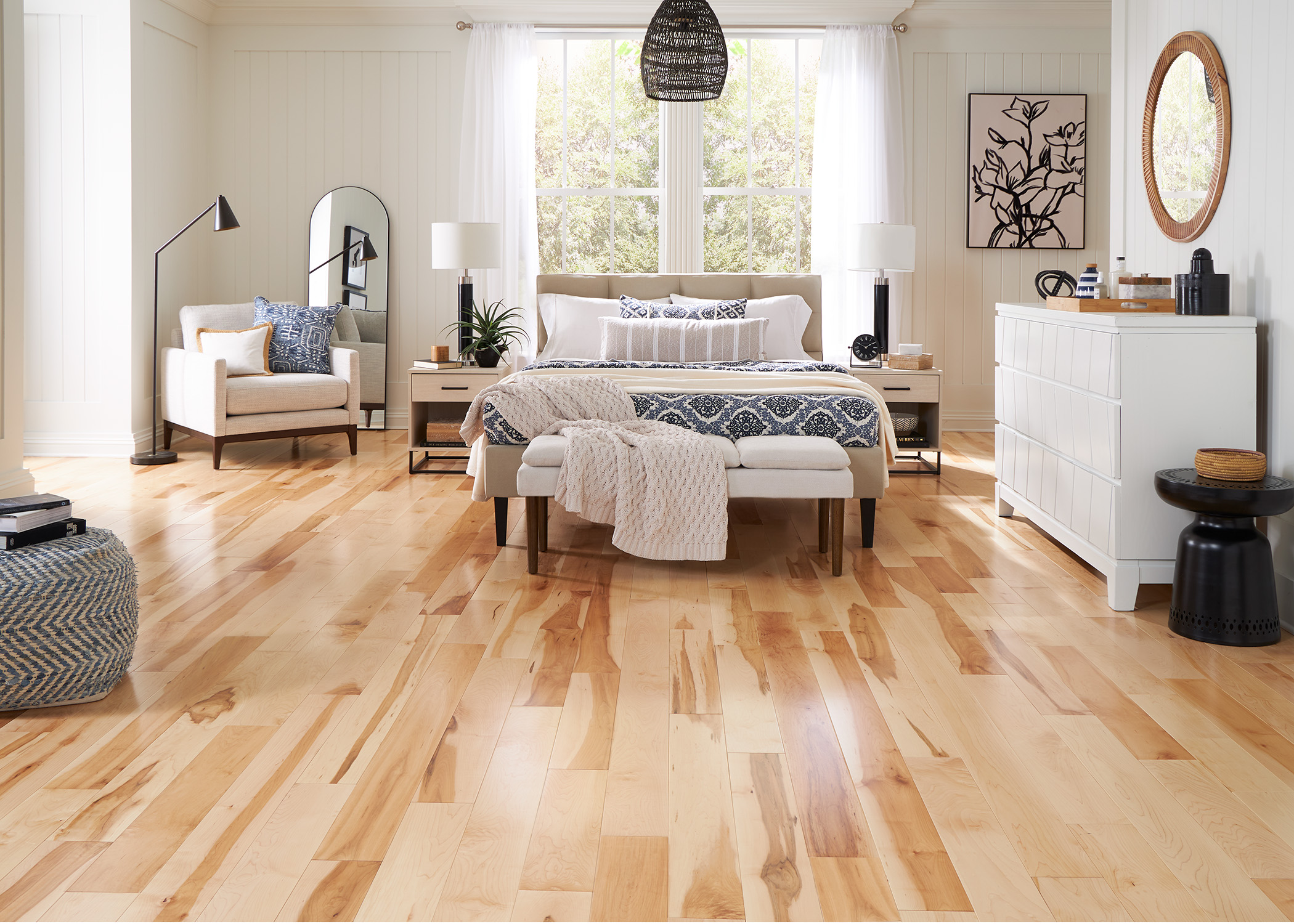 a bedroom with hardwood flooring shows distinct style