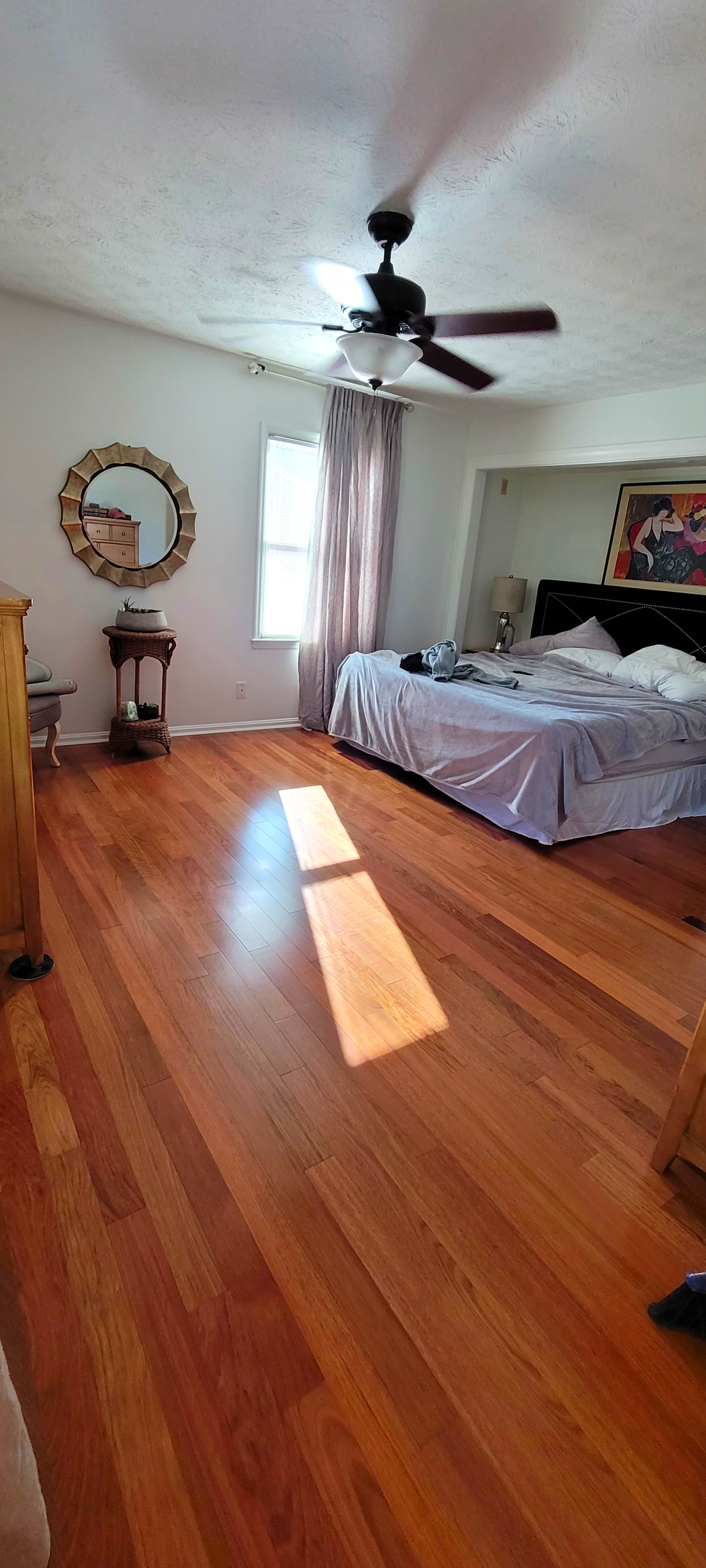 bedroom with new brazilian cherry hardwood flooring