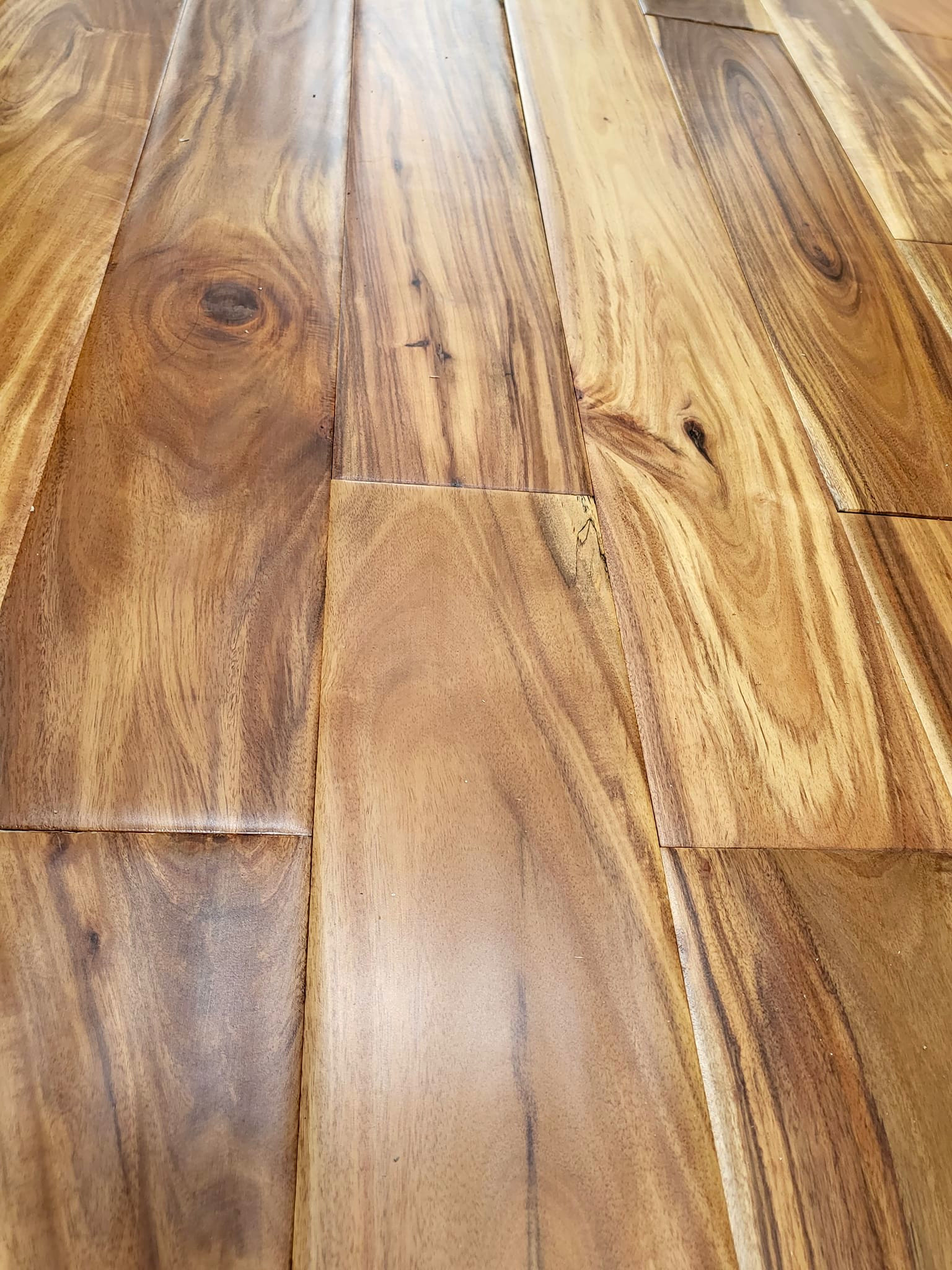 close up of Tobacco Road Acacia hardwood flooring from ll flooring