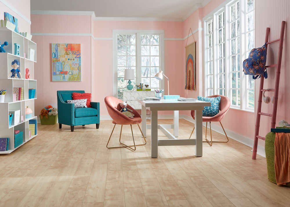6mm+pad Buckingham Poplar Rigid Vinyl Plank in children's work room with pink walls, pink oval chairs and dark turquoise side chair
