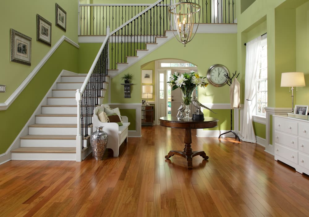 3/4 in. Brazilian Cherry Solid Hardwood Flooring 3.84 in. Wide in entryway with green walls and stairs