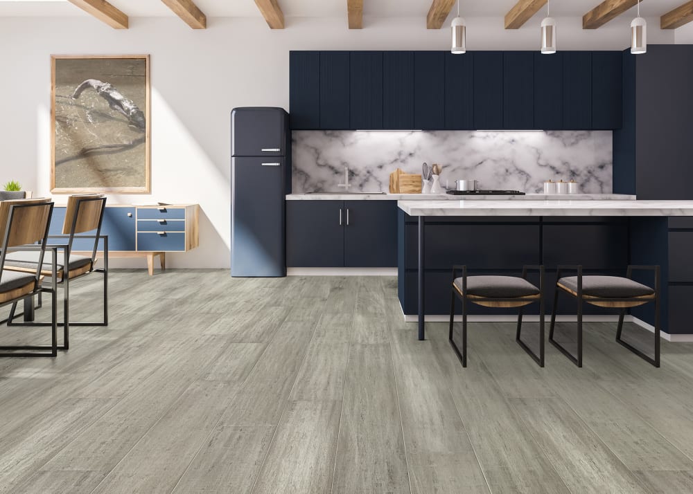 7mm+Pad x 7.48 in Everest Water-resistant Distressed Engineered Bamboo Flooring in kitchen with wood beams and navy cabinets