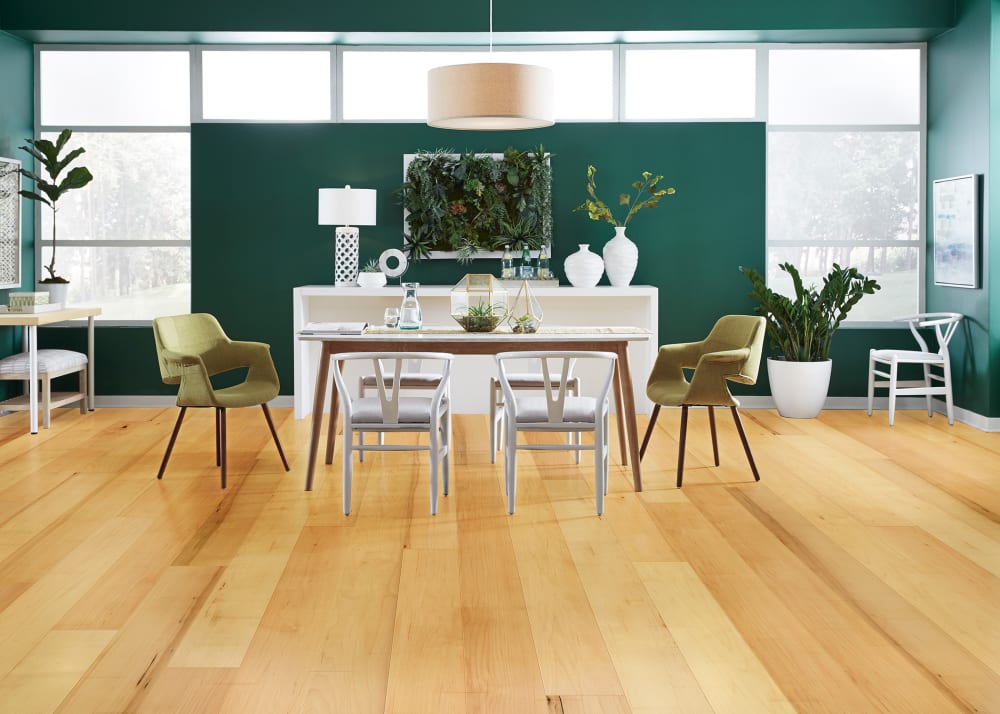 3/8 in x 5 in Natural Maple Engineered Hardwood Flooring in dining room with dark green walls and dining table with moss and white colored chairs