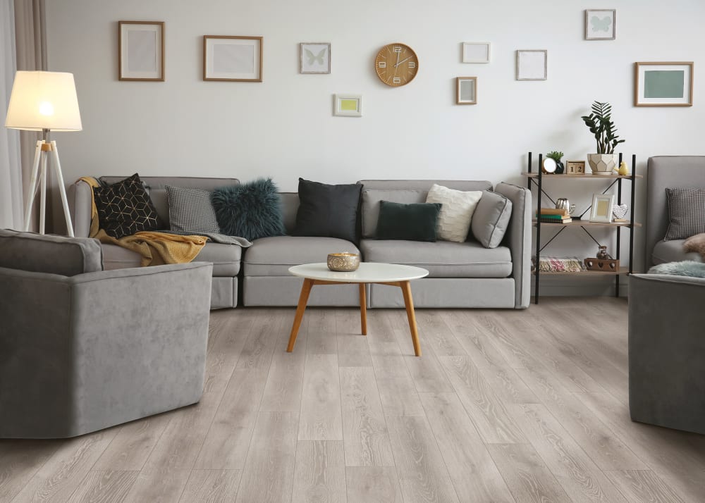 5mm+Pad Sheffield Oak Rigid VInyl Plank Flooring in living room with beige furnishings