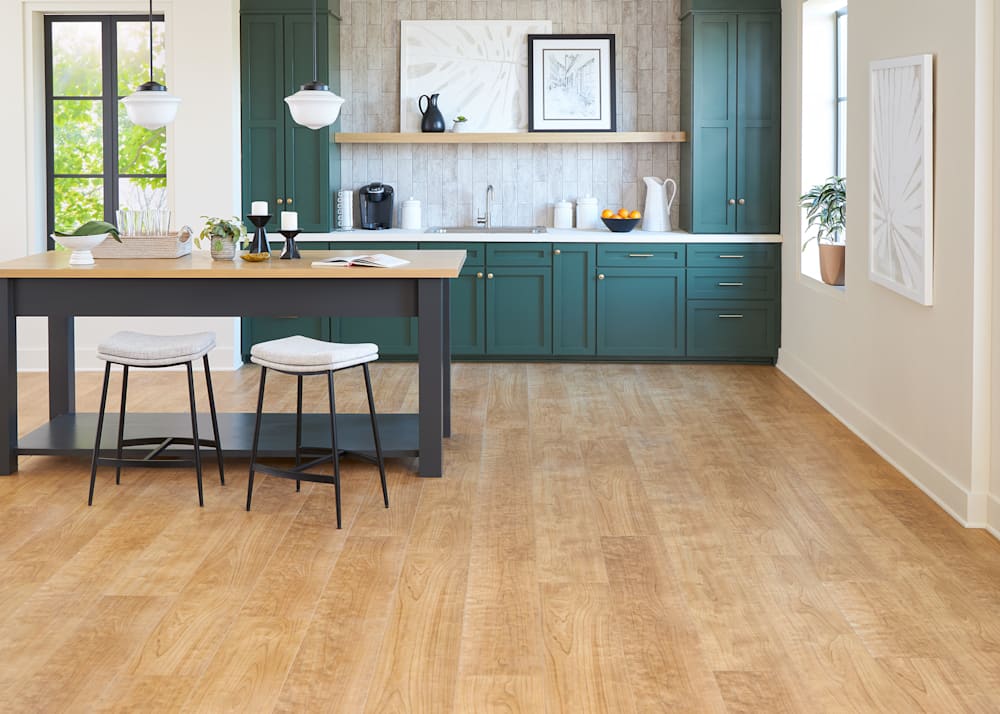 7mm w/Pad Camden Springs Cherry Rigid Vinyl Plank Flooring in kitchen with turquoise cabinets plus light wood and dark gray island with white stools